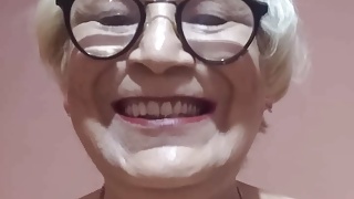 Beautiful vagina of granny Angela. Showing the inside